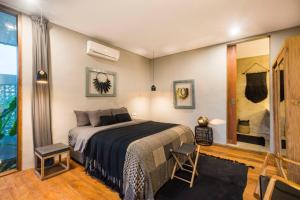 Ένα ή περισσότερα κρεβάτια σε δωμάτιο στο Modern Edgy Sophisticated Base, close to all - 2BR Villa +37 φωτογραφίες