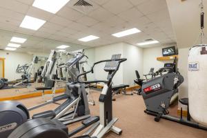 a gym with treadmills and elliptical machines at The Corral at Breckenridge by Summit County Mountain Retreat in Breckenridge