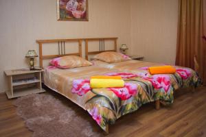 Roshchinskaya Guest house tesisinde bir odada yatak veya yataklar