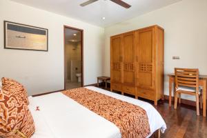 Cama o camas de una habitación en Villa Griya Aditi