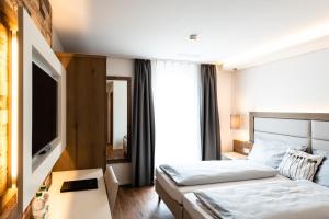 Postel nebo postele na pokoji v ubytování Hotel Rubus