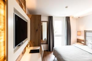 Postel nebo postele na pokoji v ubytování Hotel Rubus