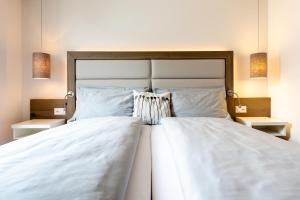 Postel nebo postele na pokoji v ubytování Hotel Rubus