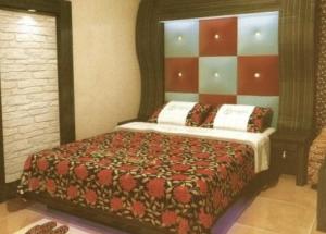 Postel nebo postele na pokoji v ubytování Opera Motel