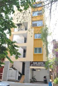 a building with a sign in front of it at HOTEL THE ROYAL PARK in Bangalore