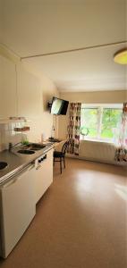 Una cocina o kitchenette en Nipanhotellet