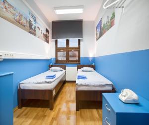 Cama ou camas em um quarto em Hostel Bureau