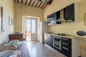 Η κουζίνα ή μικρή κουζίνα στο Casa do sol villa barbacci