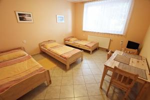 Postel nebo postele na pokoji v ubytování Penzion Soutok