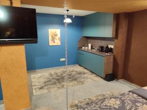 a room with a swing in a room at Кокиче 3 in Sofia