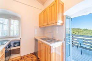 A kitchen or kitchenette at Villa Adamantia Paxos