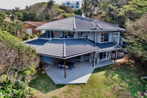 an overhead view of a house with a metal roof at Oceans Paradise in Ballito