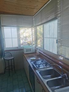 A kitchen or kitchenette at Monolocale Ischia Isola Verde