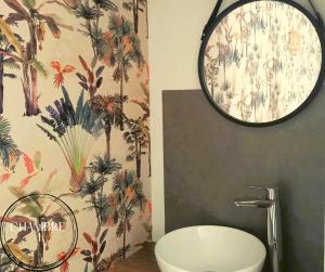 a bathroom with a sink and a large mirror at L'authentique Martelaise PISCINE CHAUFFEE in Martel +28 photos