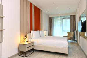 WestSide Residences by Rotana客房内的一张或多张床位
