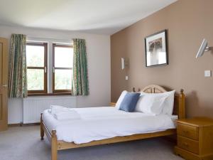Łóżko lub łóżka w pokoju w obiekcie Battanropie Lodge