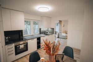 Kuchyň nebo kuchyňský kout v ubytování Ferienwohnung Alpblick