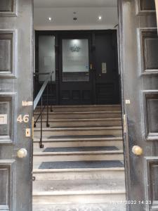 a view of the front doors of a building at Sky Apartments in Bradford