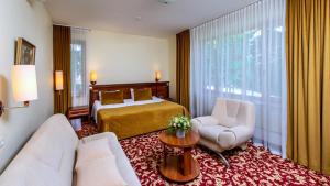 Postel nebo postele na pokoji v ubytování Hotel Violeta