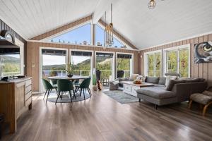 a living room with a couch and a table at Libehi in Lona