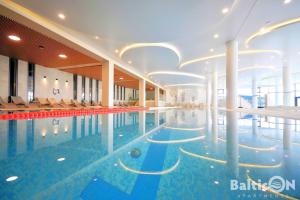 Swimming pool sa o malapit sa Apartamenty BalticON Polanki Aqua