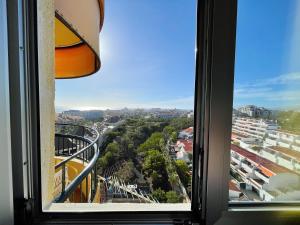 Nespecifikovaný výhled na destinaci Playa de las Americas nebo výhled na město při pohledu z apartmánu