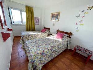 Postel nebo postele na pokoji v ubytování Torres del Sol