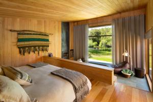 Ένα ή περισσότερα κρεβάτια σε δωμάτιο στο andBeyond Vira Vira