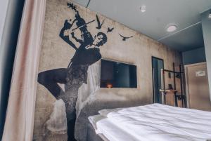 Postel nebo postele na pokoji v ubytování Smarthotel Bodø