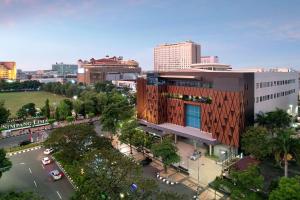 an overhead view of a city with a building at ibis Styles Semarang Simpang Lima in Semarang