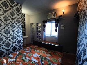 Fotografie z fotogalerie ubytování Vishnu Rest House v destinaci Váránasí
