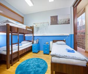 Cama ou camas em um quarto em Hostel Bureau