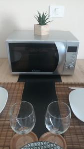 TV a/nebo společenská místnost v ubytování Rosa Amarilla Apartment