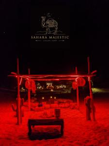 a bench in the middle of a park at Sahara Majestic Luxury Camp in Merzouga