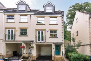 an image of a large white house at Blaisedell House by Cliftonvalley Apartments in Bristol