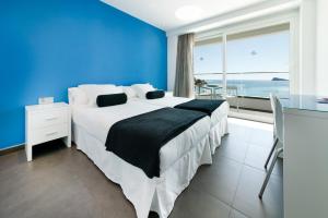 Postel nebo postele na pokoji v ubytování Hotel Brisa