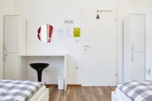 Cama ou camas em um quarto em Lovecroatia Zagreb - 'Pax nest'