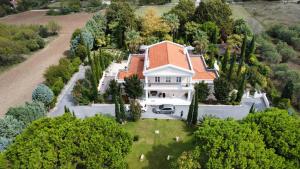 an aerial view of a white house with an orange roof at Villa Elena in Perea