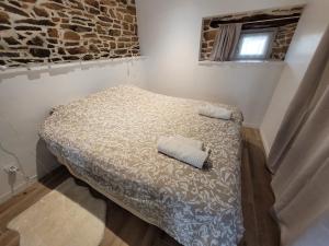 Postel nebo postele na pokoji v ubytování Tout au bout du chemin
