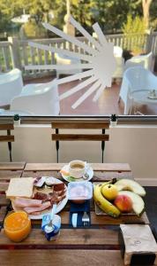 Breakfast options available to guests at Albergue As Pozas Termais