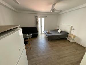 Posteľ alebo postele v izbe v ubytovaní Arguineguin Beach Lux Solarium Sky
