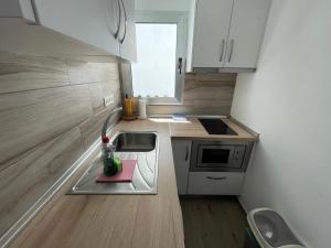 Kuchyňa alebo kuchynka v ubytovaní Arguineguin Beach Lux Solarium Sky