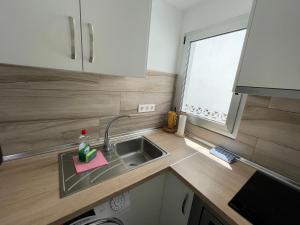 Kuchyňa alebo kuchynka v ubytovaní Arguineguin Beach Lux Solarium Sky