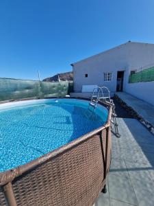 a swimming pool in the backyard of a house at Casa Rocio in Güimar