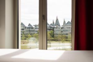 Postel nebo postele na pokoji v ubytování B&B HOTEL Antwerpen Zuid