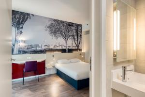 Postel nebo postele na pokoji v ubytování B&B HOTEL Antwerpen Zuid