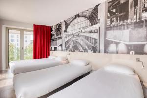 Postel nebo postele na pokoji v ubytování B&B HOTEL Antwerpen Zuid
