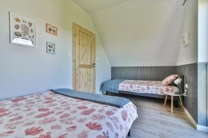 Postel nebo postele na pokoji v ubytování Domki z Pasją