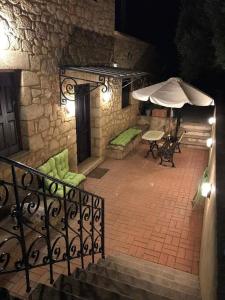 Patio alebo iná vonkajšia časť ubytovania Olive Cottage