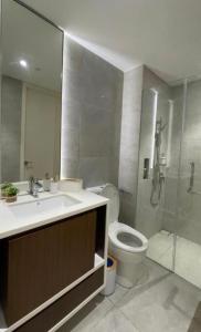 a bathroom with a sink and a toilet and a shower at Hilton Hill10 Shah Alam in Shah Alam